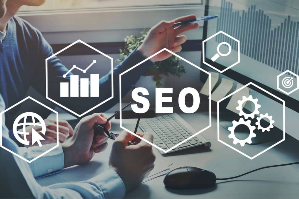 Small Business Employees looking at SEO report on computer